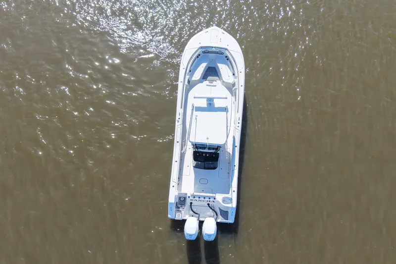  Yacht Photos Pics Aerial view of 2020 Tidewater 320 CC Adventure boat on water.