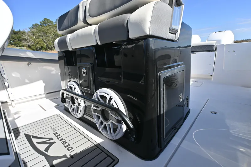  Yacht Photos Pics 2020 Tidewater 320 CC Adventure boat interior with seating and storage compartments.