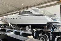 Custom KAITOS 68 yacht in a shipyard, 2023 model, elevated on supports.