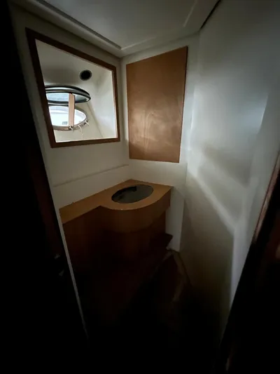  Yacht Photos Pics Compact bathroom interior on 2023 Custom KAITOS 68 yacht, featuring modern design elements.