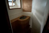 Compact bathroom interior on 2023 Custom KAITOS 68 yacht, featuring modern design elements.