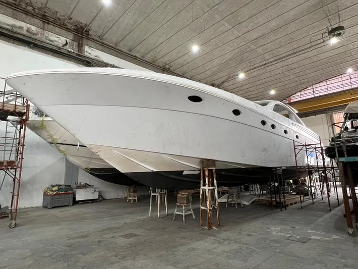  Yacht Photos Pics Custom KAITOS 68 yacht under construction in a spacious indoor facility, 2023 model.