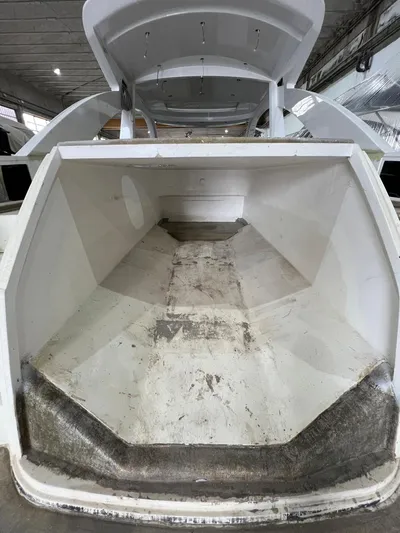  Yacht Photos Pics Custom KAITOS 68 yacht interior, 2023 model, showcasing spacious storage compartment.