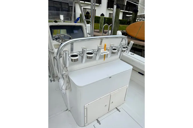 Ribeye Yacht Photos Pics 2005 Jupiter 31 Center Console boat with rod holders and storage compartments.