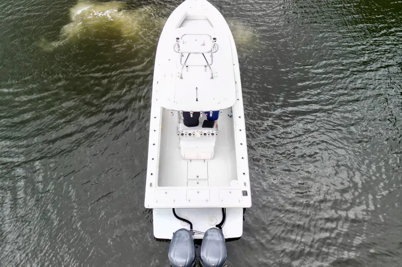 Ribeye Yacht Photos Pics Aerial view of 2005 Jupiter 31 Center Console boat on water.