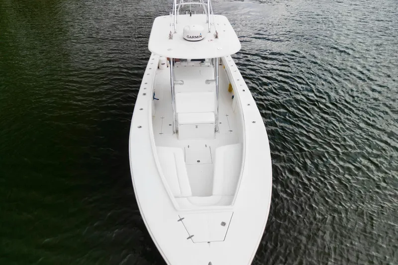 Ribeye Yacht Photos Pics 2005 Jupiter 31 Center Console boat on calm water, aerial view.