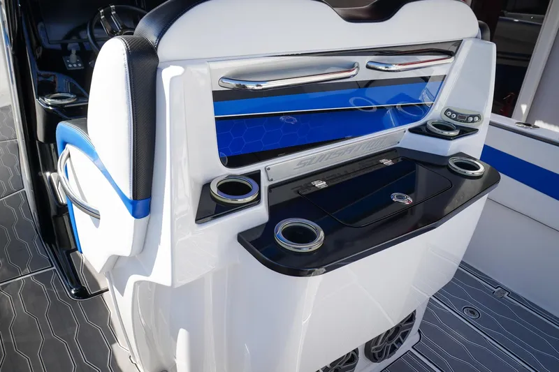 Never Enough Yacht Photos Pics 2023 Sunsation 32 CCX boat interior with sleek seating and modern design elements.