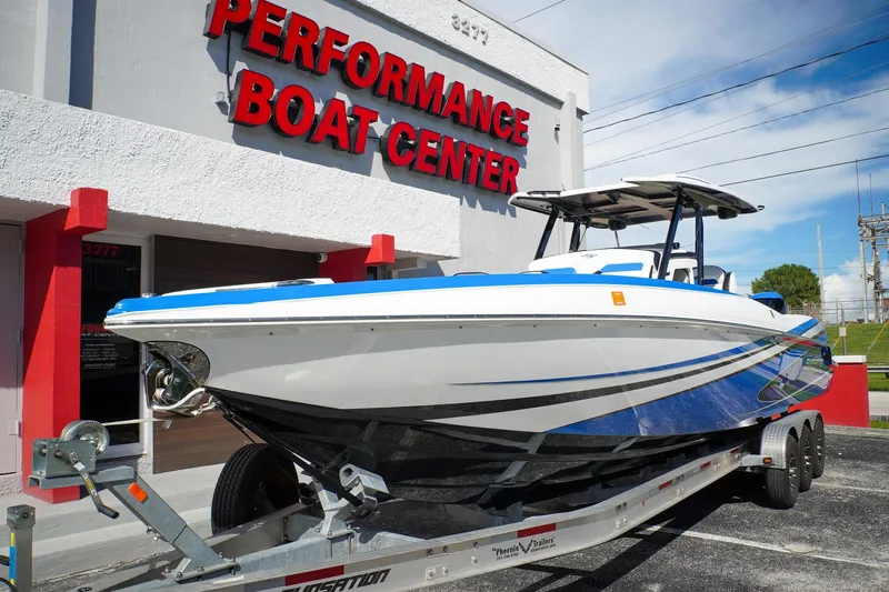 Never Enough Yacht Photos Pics 2023 Sunsation 32 CCX boat on trailer at Performance Boat Center.