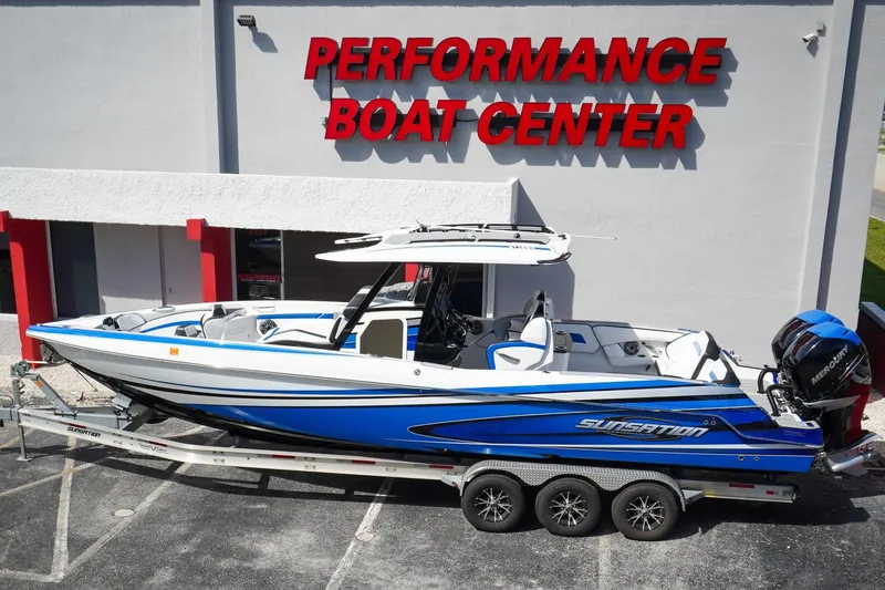 Never Enough Yacht Photos Pics 2023 Sunsation 32 CCX boat in blue at Performance Boat Center.