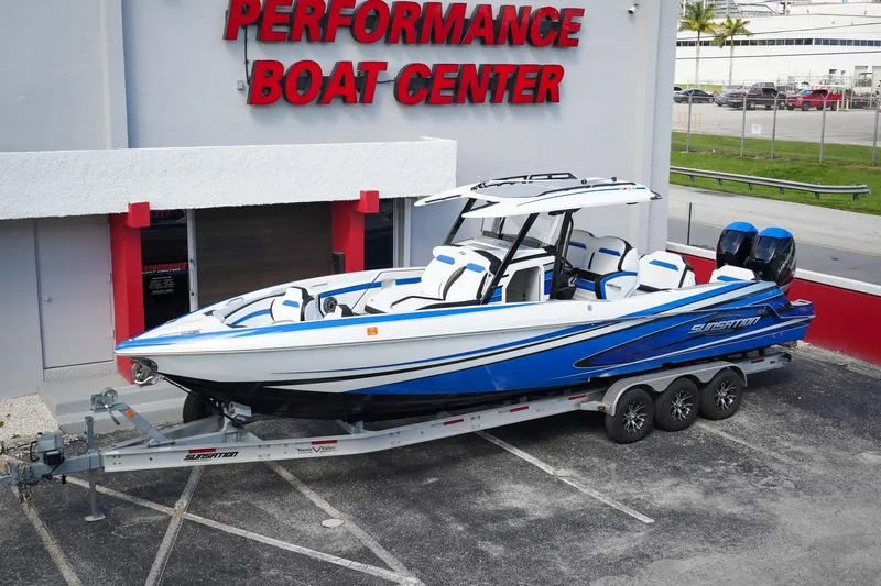 Never Enough Yacht Photos Pics 2023 Sunsation 32 CCX boat in blue and white at Performance Boat Center.