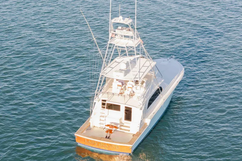 Lady Dianne Yacht Photos Pics 1999 Bertram 60 Convertible yacht on open water, rear view.