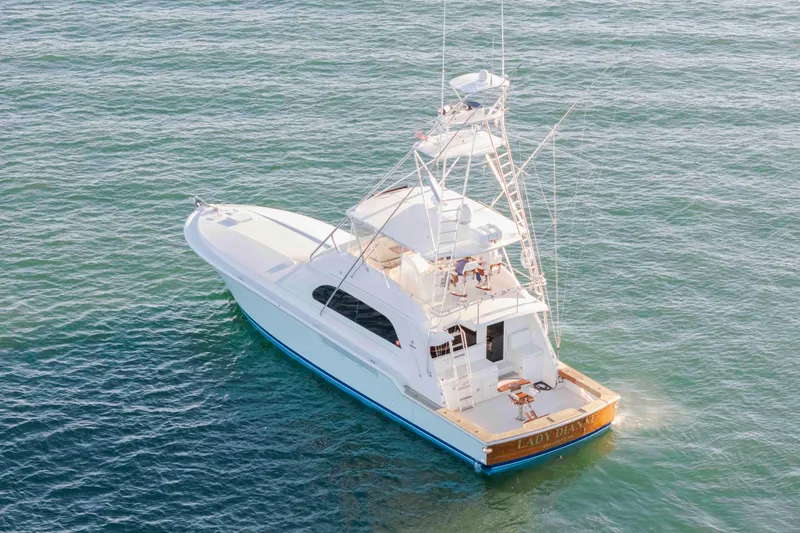 Lady Dianne Yacht Photos Pics 1999 Bertram 60 Convertible yacht cruising on open water.