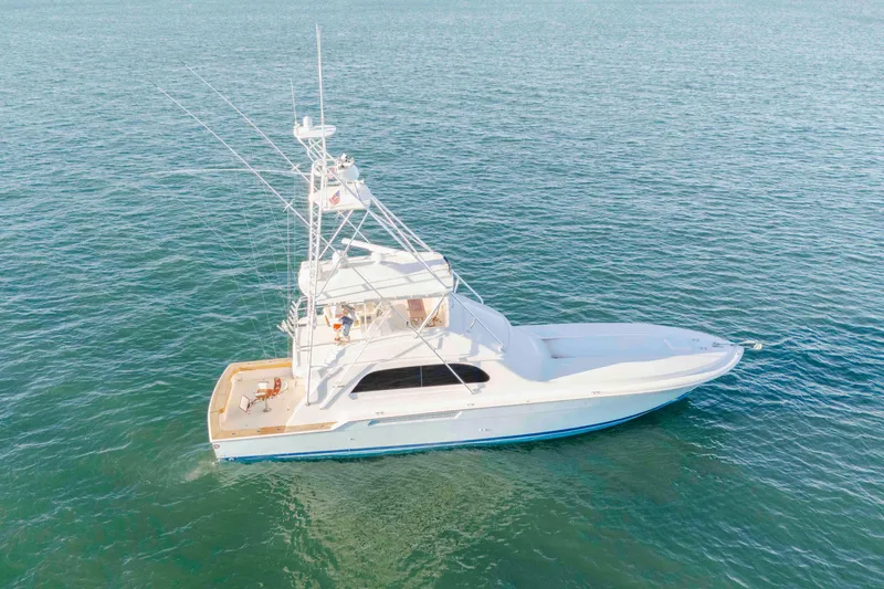 Lady Dianne Yacht Photos Pics 1999 Bertram 60 Convertible yacht cruising on open water.