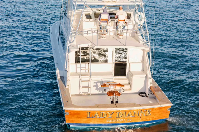 Lady Dianne Yacht Photos Pics 1999 Bertram 60 Convertible yacht "Lady Dianne" cruising on open water.