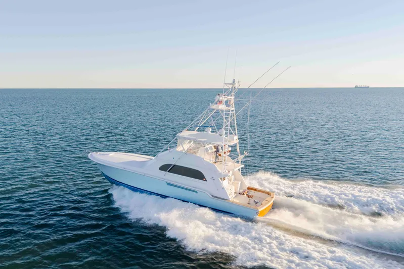 Lady Dianne Yacht Photos Pics 1999 Bertram 60 Convertible yacht cruising on open sea.