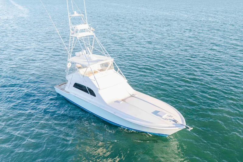 Lady Dianne Yacht Photos Pics 1999 Bertram 60 Convertible yacht cruising on open water.