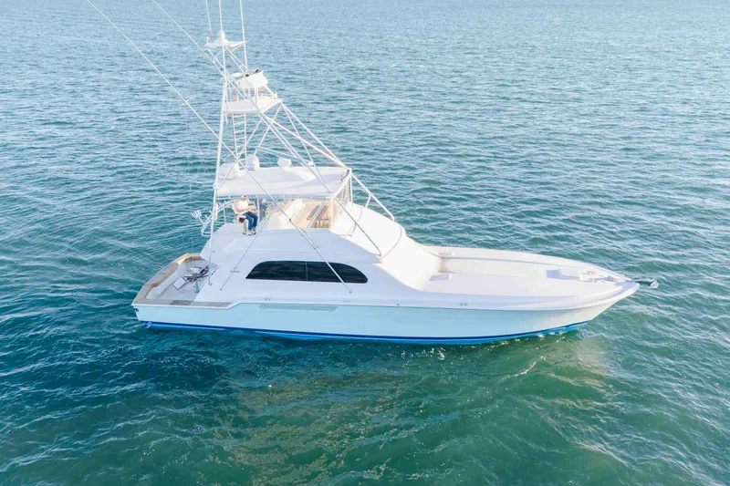 Lady Dianne Yacht Photos Pics 1999 Bertram 60 Convertible yacht cruising on open water.