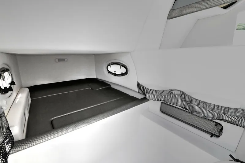  Yacht Photos Pics 2020 Nor-Tech 340 Sport cabin interior with sleek design and comfortable sleeping area.