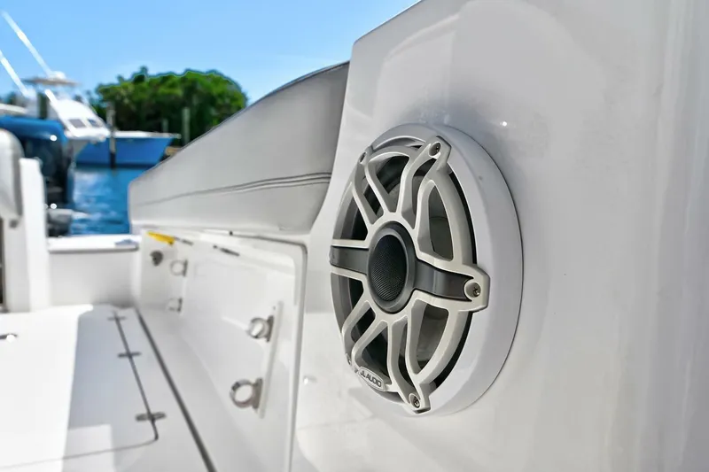  Yacht Photos Pics 2020 Nor-Tech 340 Sport boat with speaker detail, docked in a marina.