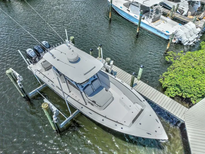  Yacht Photos Pics 2020 Nor-Tech 340 Sport boat docked in marina, aerial view.