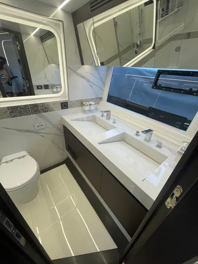 Silver Arrow Yacht Photos Pics Luxurious bathroom in 2024 Galeon 700 Sky yacht with modern fixtures and elegant design.