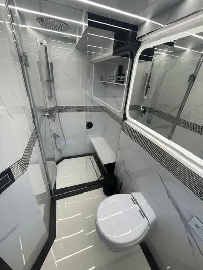 Silver Arrow Yacht Photos Pics Luxurious bathroom in 2024 Galeon 700 Sky yacht with modern fixtures and sleek design.