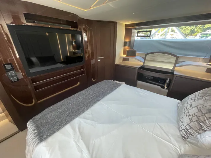 Silver Arrow Yacht Photos Pics Luxurious bedroom interior of 2024 Galeon 700 Sky yacht with modern amenities.