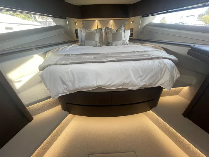 Silver Arrow Yacht Photos Pics Luxurious bedroom interior of 2024 Galeon 700 Sky yacht with elegant lighting and modern design.