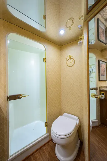  Yacht Photos Pics 2008 Viking 56 Enclosed Bridge yacht bathroom with shower and toilet.