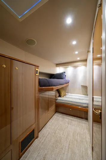  Yacht Photos Pics 2008 Viking 56 Enclosed Bridge cabin with bunk beds and wooden cabinetry.