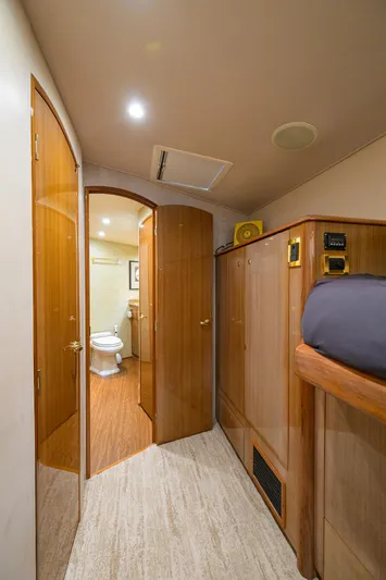  Yacht Photos Pics Interior of 2008 Viking 56 Enclosed Bridge yacht, featuring hallway and bathroom.