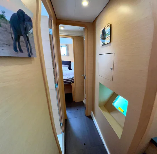 Celestra Yacht Photos Pics Interior hallway of 2017 Lagoon 400 S2 catamaran with bedroom view.