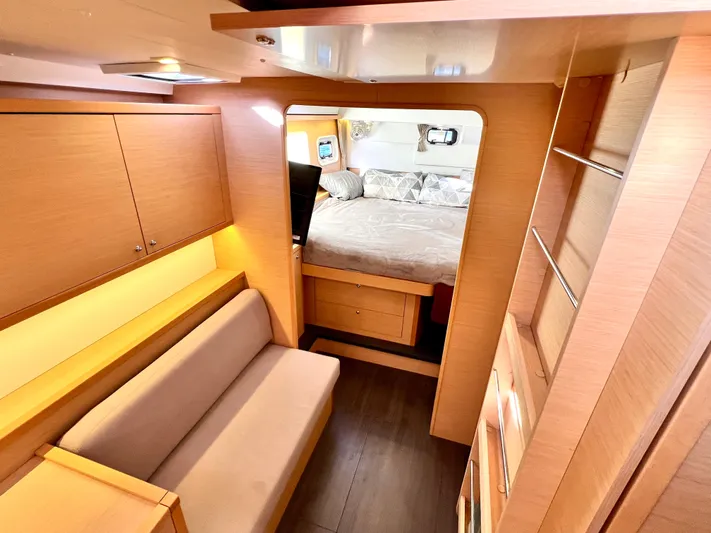 Celestra Yacht Photos Pics Interior of 2017 Lagoon 400 S2 yacht, featuring cozy seating and a bedroom.
