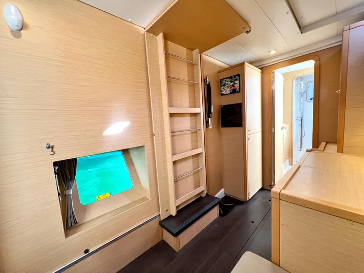 Celestra Yacht Photos Pics Interior of 2017 Lagoon 400 S2 catamaran with modern wood finish and compact design.