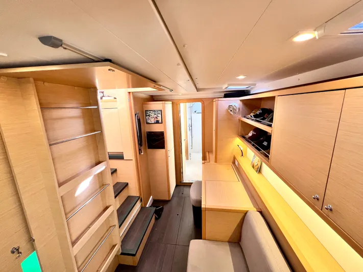 Celestra Yacht Photos Pics Interior of 2017 Lagoon 400 S2 catamaran, featuring modern wood finishes and cozy seating area.