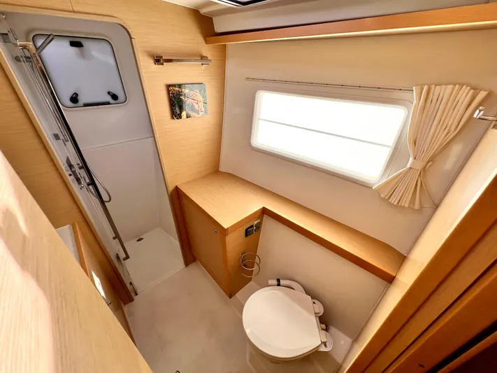 Celestra Yacht Photos Pics 2017 Lagoon 400 S2 yacht bathroom with modern fixtures and natural light.