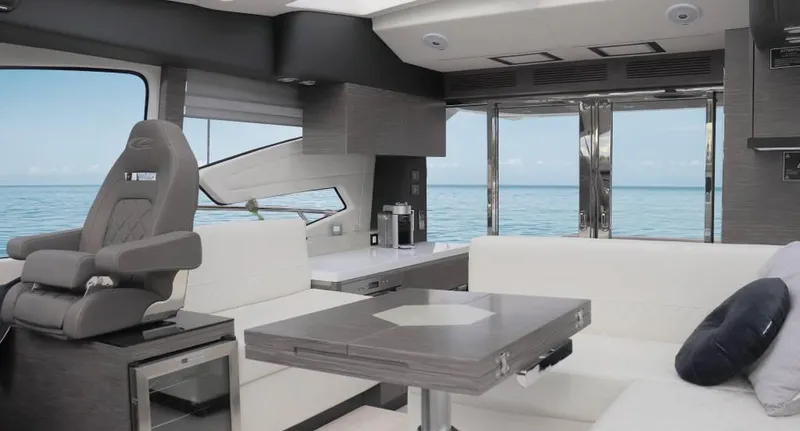  Yacht Photos Pics Luxurious interior of 2025 Cobrey 52 HT yacht with ocean view.
