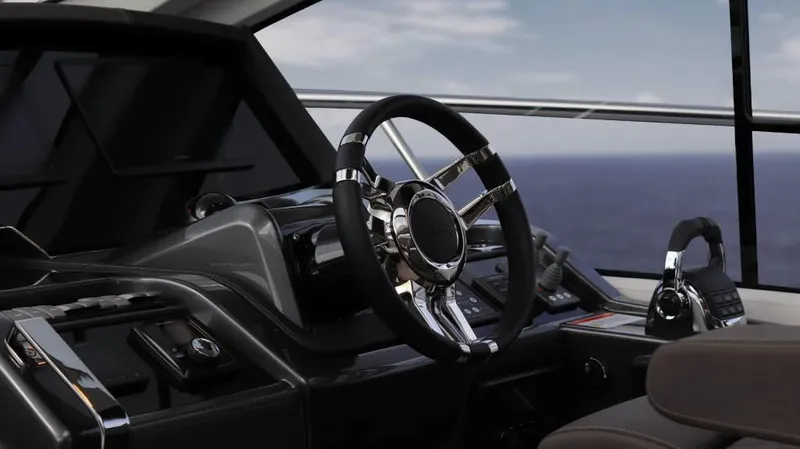  Yacht Photos Pics Interior view of 2025 Cobrey 52 HT yacht helm with ocean backdrop.