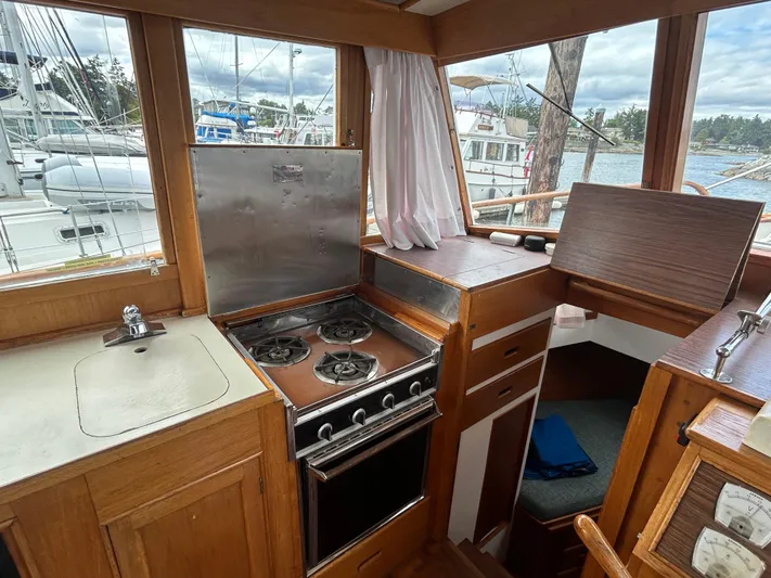 Brie Yacht Photos Pics Interior of 1980 Grand Banks 36 Classic boat with stove and sink.