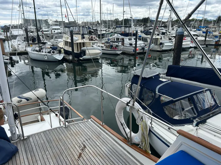Brie Yacht Photos Pics 1980 Grand Banks 36 Classic yacht docked in a busy marina.