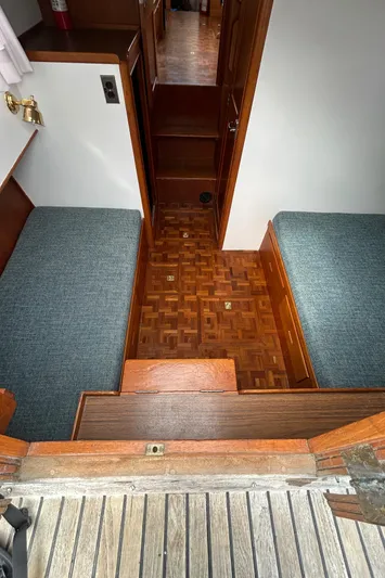 Brie Yacht Photos Pics 1980 Grand Banks 36 Classic interior with wooden flooring and twin beds.