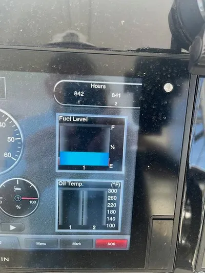 Yacht Photos Pics 2019 Regal 33 SAV dashboard showing fuel level, oil temperature, and engine hours.