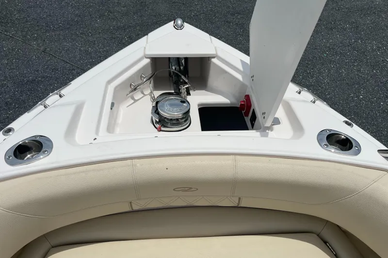 Yacht Photos Pics 2019 Regal 33 SAV boat bow with anchor storage and seating area.