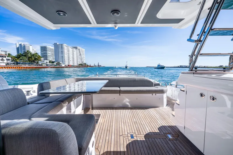 Azure Yacht Photos Pics Luxurious 2021 Azimut S6 yacht deck with ocean view and modern seating area.