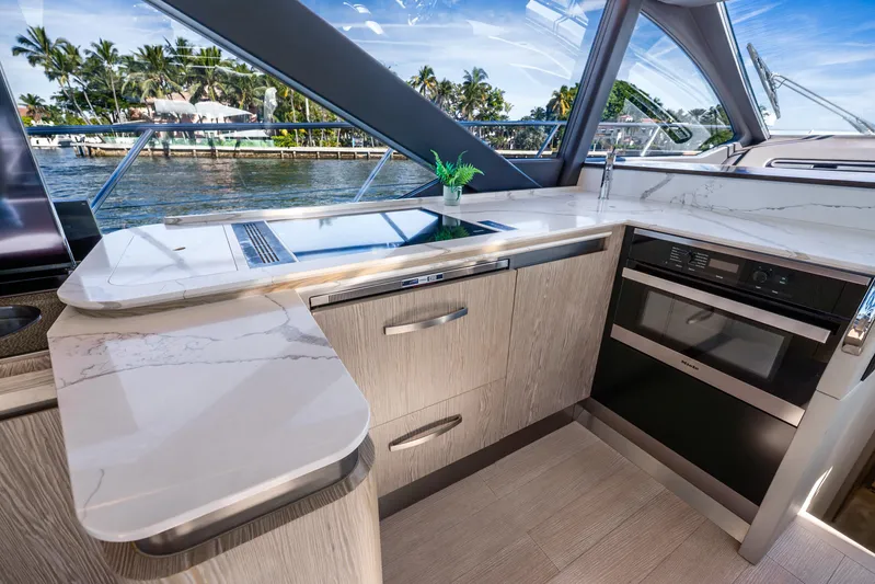 Azure Yacht Photos Pics Luxurious 2021 Azimut S6 yacht kitchen with modern appliances and elegant design.