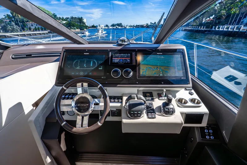 Azure Yacht Photos Pics Cockpit of 2021 Azimut S6 yacht with advanced navigation displays and controls.