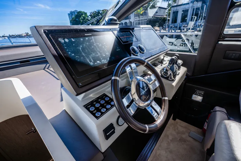 Azure Yacht Photos Pics 2021 Azimut S6 yacht helm with modern controls and sleek steering wheel.