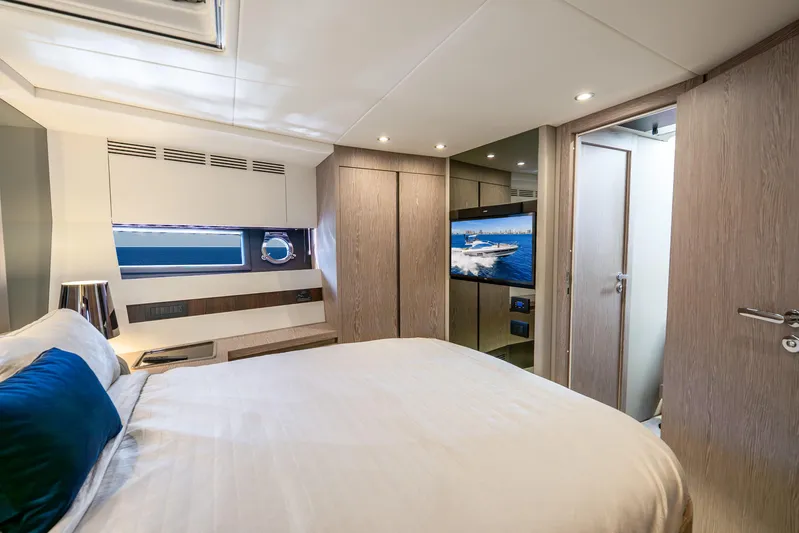 Azure Yacht Photos Pics Luxurious interior of 2021 Azimut S6 yacht bedroom with modern design and amenities.