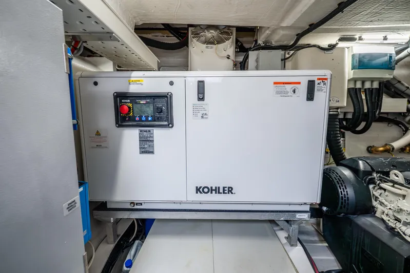 Azure Yacht Photos Pics Engine room of 2021 Azimut S6 yacht featuring a Kohler generator.