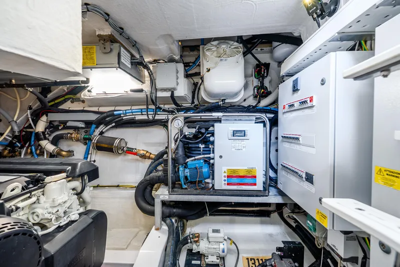 Azure Yacht Photos Pics Engine room of 2021 Azimut S6 yacht, featuring complex machinery and electrical systems.